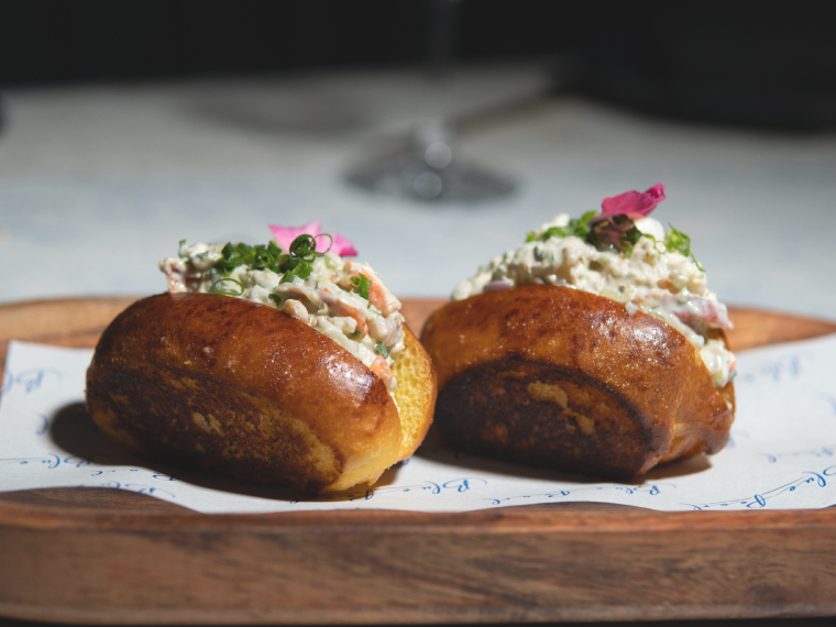 New England lobster rolls on a wooden board