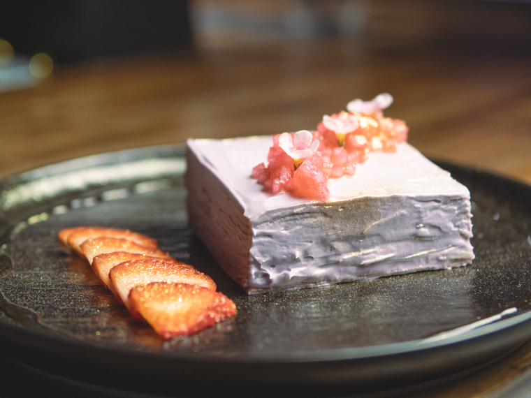 Taro crepe cake with wildflower honey and strawberries